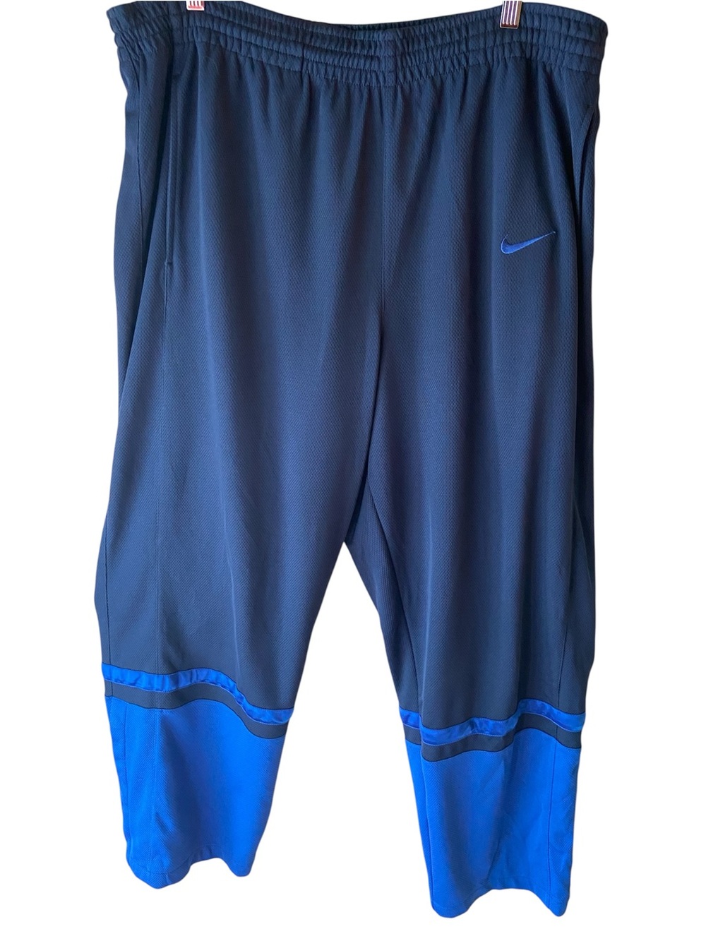 Nike Pants Men’s XL Navy Blue , snap bottom on sides lighter blue at bottom
